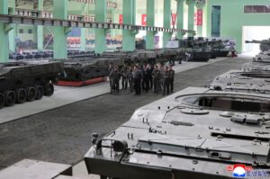 Respected Comrade Kim Jong Un Gives Field Guidance at Major Munitions Industry Enterprise 2 009
