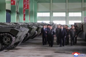 Respected Comrade Kim Jong Un Gives Field Guidance at Major Munitions Industry Enterprise 2 011