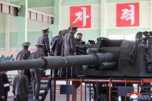Respected Comrade Kim Jong Un Gives Field Guidance at Major Munitions Industry Enterprise 2 014