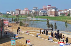 Respected Comrade Kim Jong Un Inspects Sinuiju Combined Greenhouse Farm 2 023