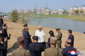 Respected Comrade Kim Jong Un Inspects Sinuiju Combined Greenhouse Farm 2 024