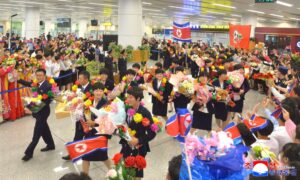 DPRK Women Footballers Return Home 2