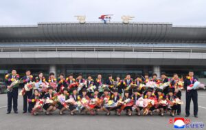 DPRK Women Footballers Return Home 4