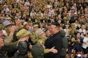 Respected Comrade Kim Jong Un Meets and Has Photo Taken with War Veterans and Persons of Wartime Merits 2 005 (1)
