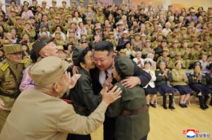 Respected Comrade Kim Jong Un Meets and Has Photo Taken with War Veterans and Persons of Wartime Merits 2 007 (2)
